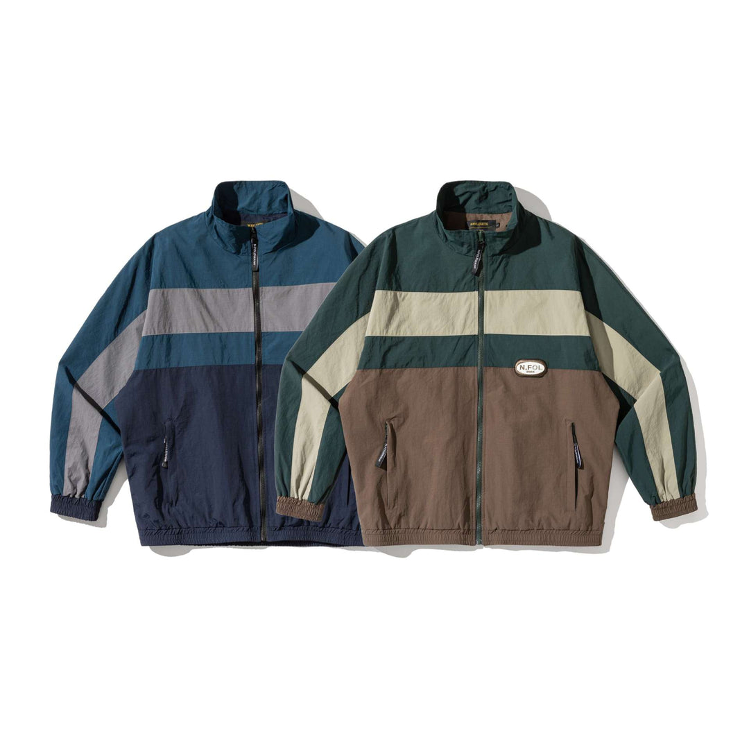 Unisex Leichte Colorblock Windbreaker‑Jacke mit Stehkragen und Elastikbündchen Shop Nory