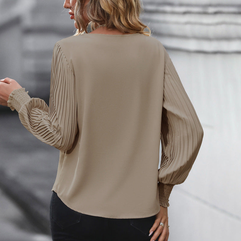 Damen Feminine V-Ausschnitt-Bluse mit plissierten Ballonärmeln und Smokmanschetten Shop Nory