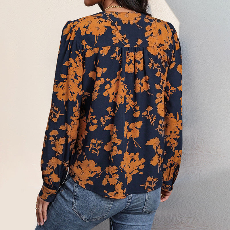Damen Lockeres Blusenshirt mit V-Ausschnitt, floralem Alloverprint, Ballonärmeln und Manschetten Shop Nory