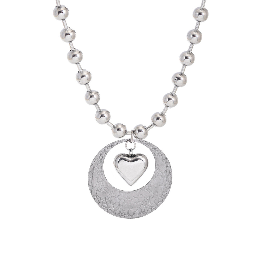 Damen Halskette mit herzförmigem Anhänger und glänzenden Perlen Shop Nory