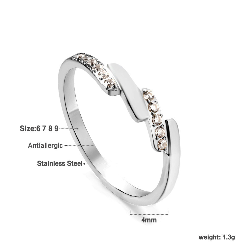 Damen Ring mit brillantem Zirkonia und eleganter Edelstahlfassung Shop Nory