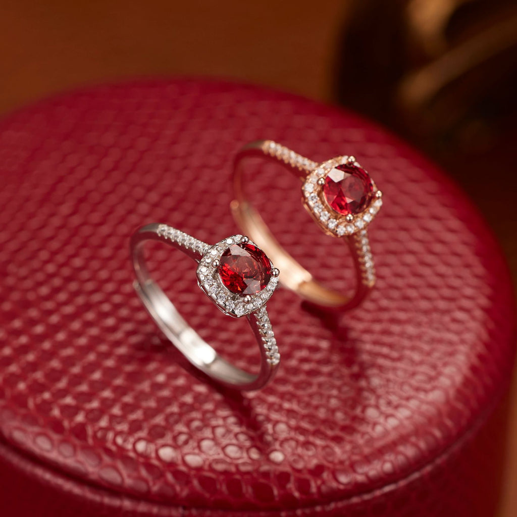 Damen Ring mit rot geschliffenem Edelstein und funkelnden Zirkoniasteinen Shop Nory