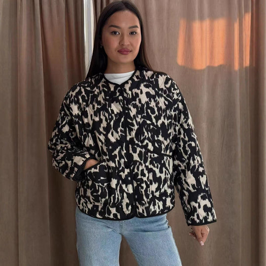 Damen Steppjacke im Oversize-Boxy-Schnitt mit rundem Halsausschnitt und abstraktem Animal-Print Shop Nory