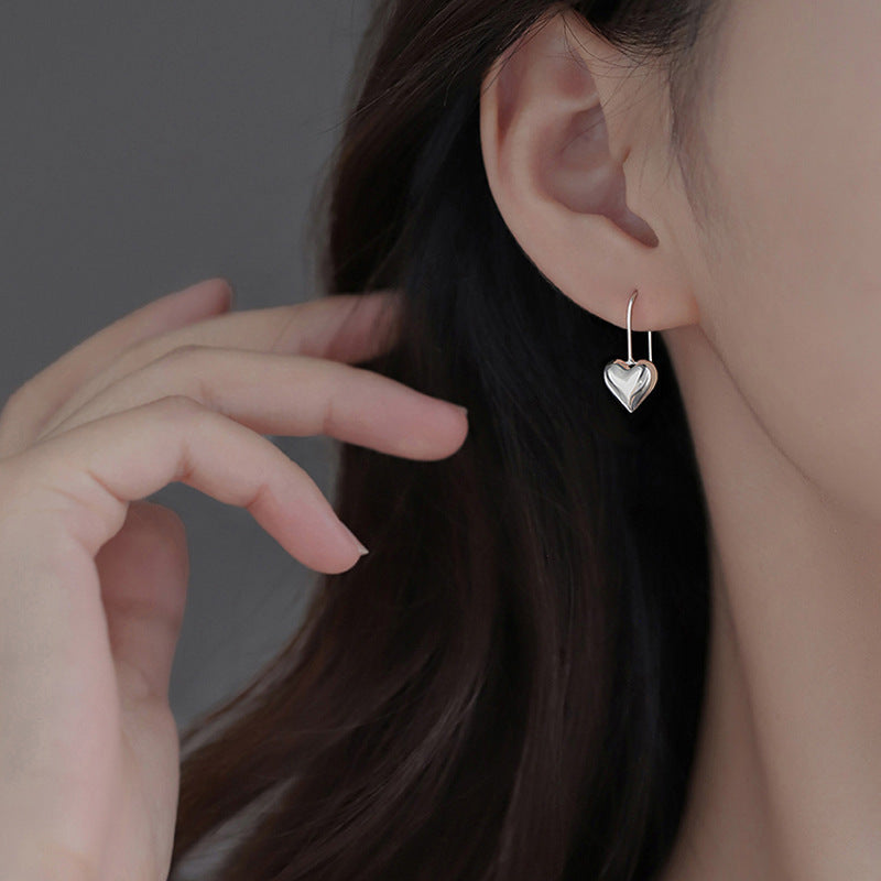 Damen Ohrringe mit stilvollem Herzdesign Shop Nory