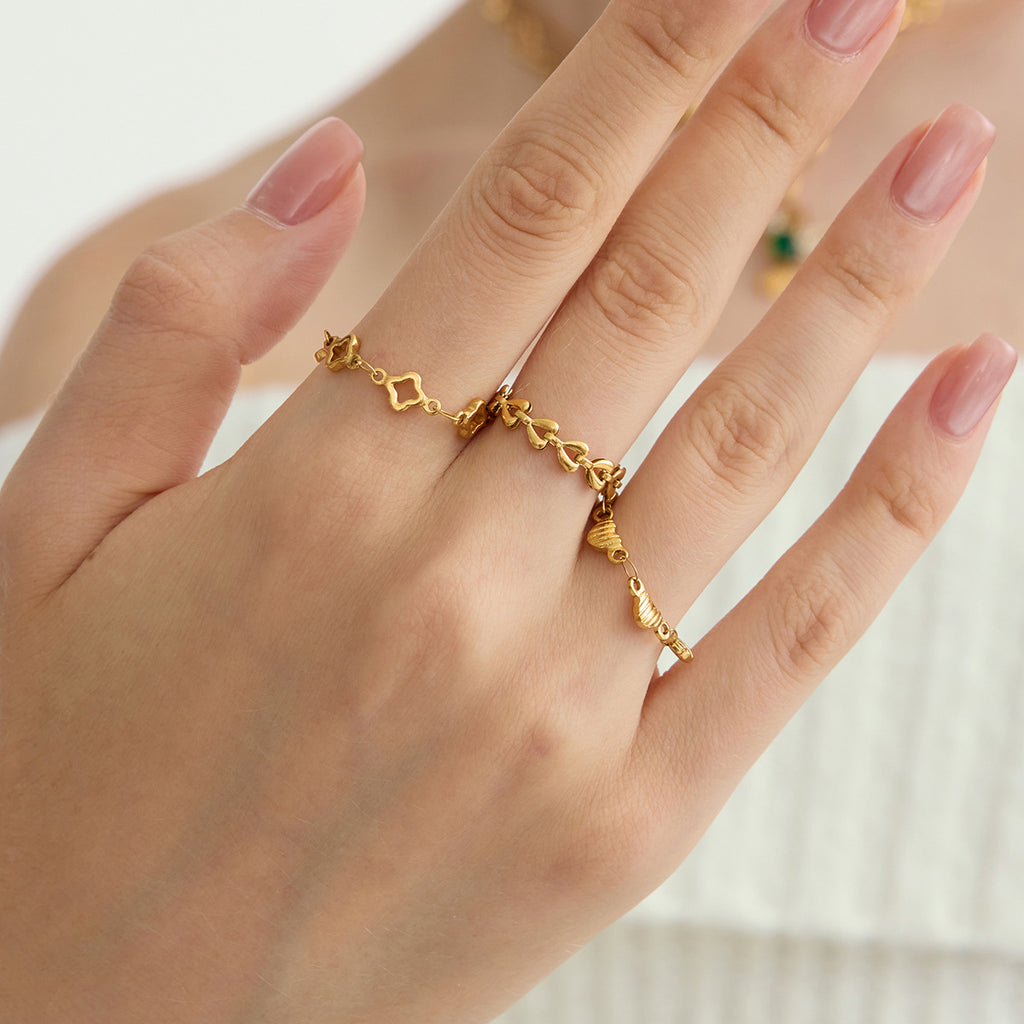 Damen Armband mit eleganten herzförmigen Elementen aus hypoallergenem Edelstahl Shop Nory