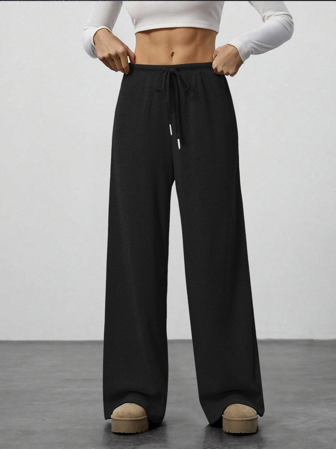 Damen Weit geschnittene Relax-Hose aus elastischem Strickmaterial mit Kordelzug