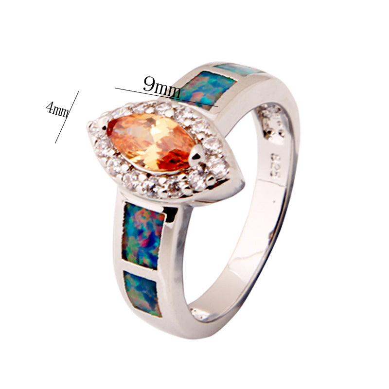 Damen Schmuckring mit funkelndem Zirkonia und schimmernden Opalmosaiken Shop Nory