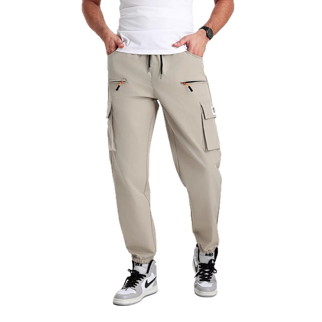Herren konisch geschnittene Utility-Cargohose im Joggerstil mit Tunnelzugbund, Reißverschlusstaschen & elastischen Beinabschlüssen Shop Nory