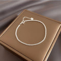 Damen Armband aus feinem Edelstahl mit funkelnden Zirkonia Shop Nory