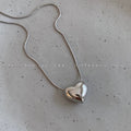Damen Halskette mit herzförmigem Anhänger aus hochwertigem Edelstahl Shop Nory
