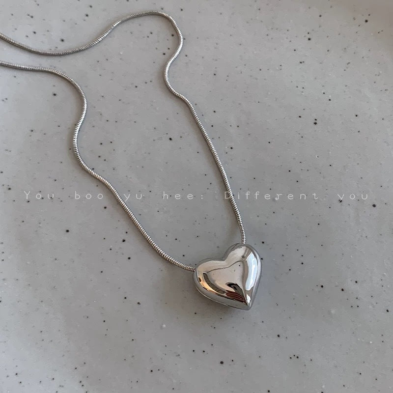 Damen Halskette mit herzförmigem Anhänger aus hochwertigem Edelstahl Shop Nory