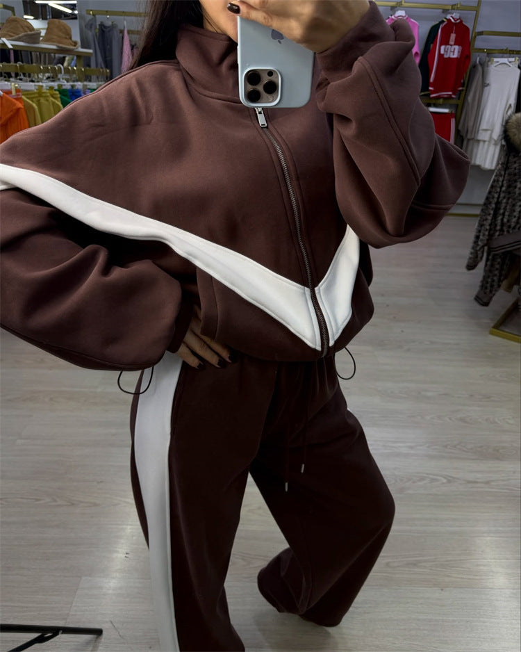 Damen eleganter sportlicher Zweiteiler Trainingsanzug mit Reißverschluss und kontrastierender V-Passe Shop Nory