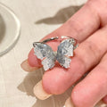 Damen Ring mit verspieltem Schmetterlingsdesign und funkelnden Zirkonia Shop Nory