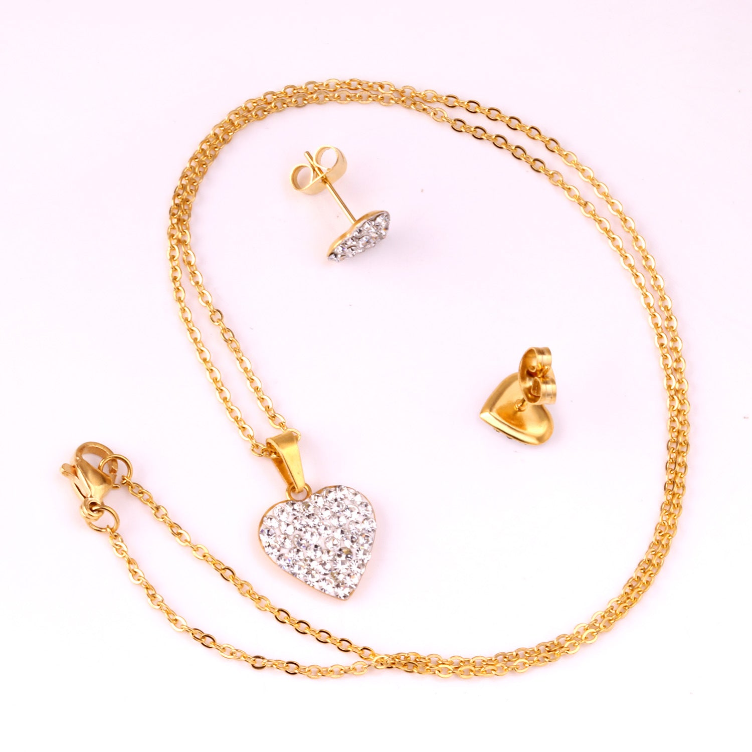 Damen Schmuckset mit funkelnden Herzanhängern und eleganten Ohrsteckern Shop Nory
