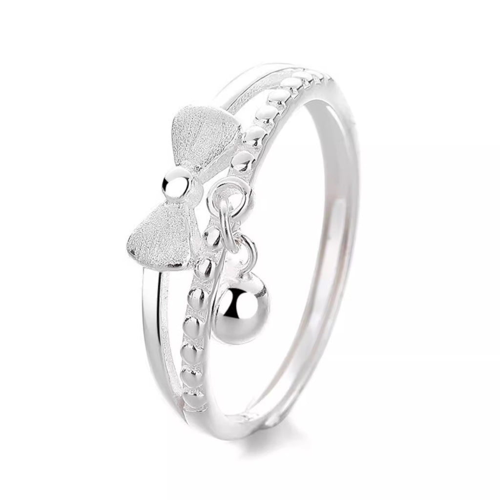Damen filigraner Ring mit verspieltem Schleifen- und Glöckchen-Design Shop Nory