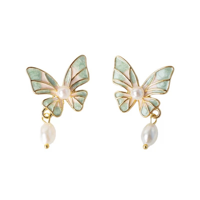 Damen Ohrringe mit kunstvollem Schmetterlingsdesign und eleganten Perlendetails Shop Nory