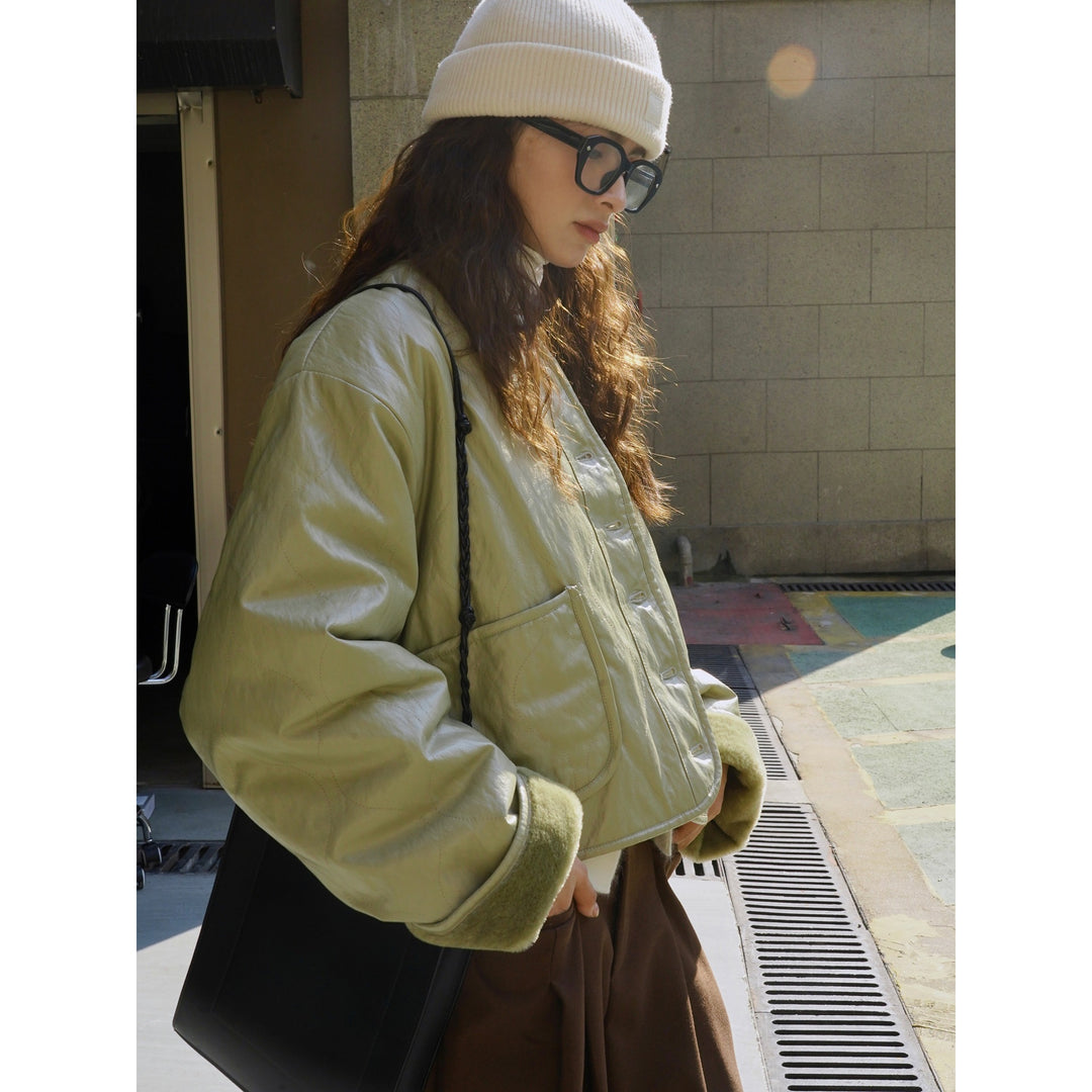 Damen Boxy Lederimitat-Jacke mit gesteppter Optik und Teddy-Futter Shop Nory