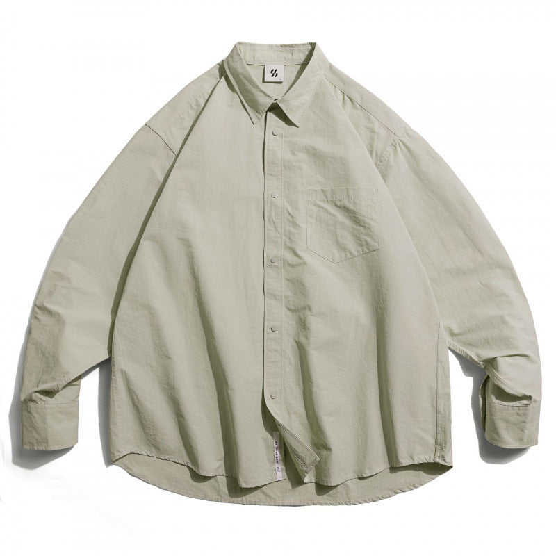 Unisex Oversize Hemd aus leichtem Baumwollmix mit überschnittener Schulter und Brusttasche Shop Nory