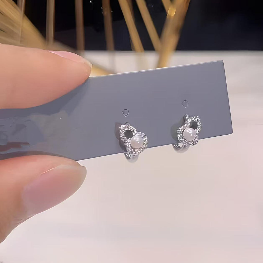 Damen Ohrstecker mit funkelndem Zirkon und elegantem Perlenmotiv Shop Nory