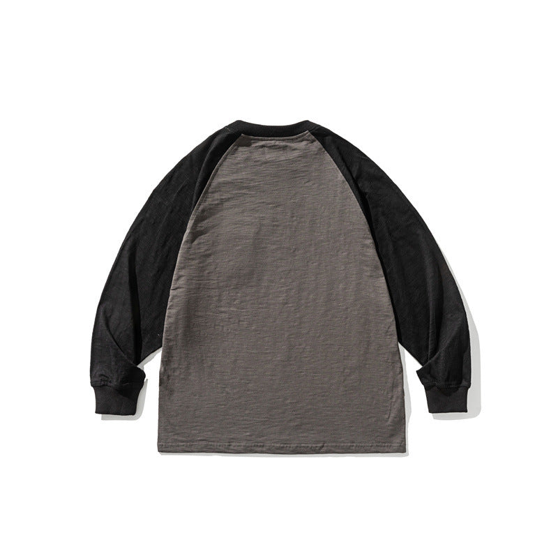 Unisex Lässiges Raglan-Longsleeve mit Kontrastärmeln und aufgesetzter Klappentasche Shop Nory