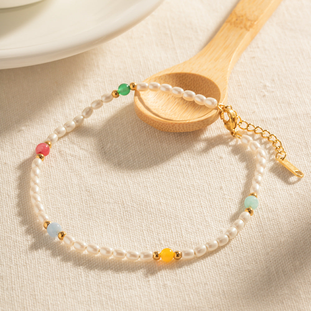 Damen Armband mit eleganten Perlen und bunten Steinakzenten Shop Nory