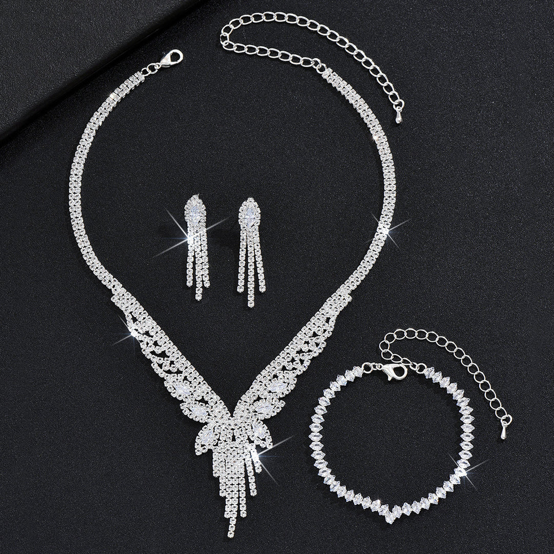 Tropfenpendant und passendes Tropfohrschmuckset für Braut mit kubischem Zirkonia-Halo