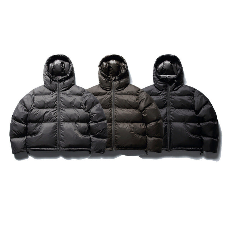 Unisex Kurze Boxy-Pufferjacke mit Volumen‑Kapuze, wasserabweisender Shell und thermischer Daunenfüllung Shop Nory