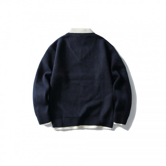 Unisex Oversize-Strickpullover mit kontrastierendem Polokragen und V‑Ausschnitt Shop Nory