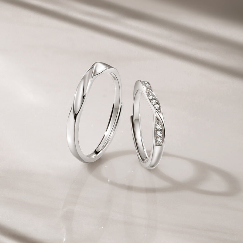 Damen Trauringe mit elegantem geschwungenem Design und funkelnden Akzenten Shop Nory