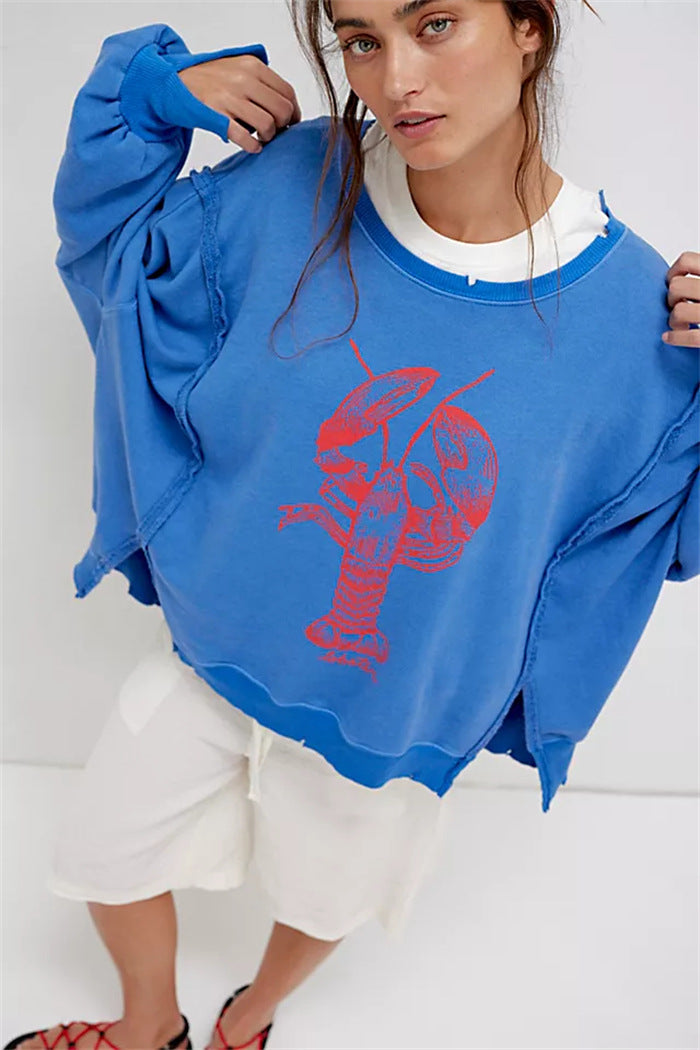 Damen oversized Sweatshirt mit Rüben-Print, ausgefransten Nahtakzenten und Daumenlochärmeln Shop Nory