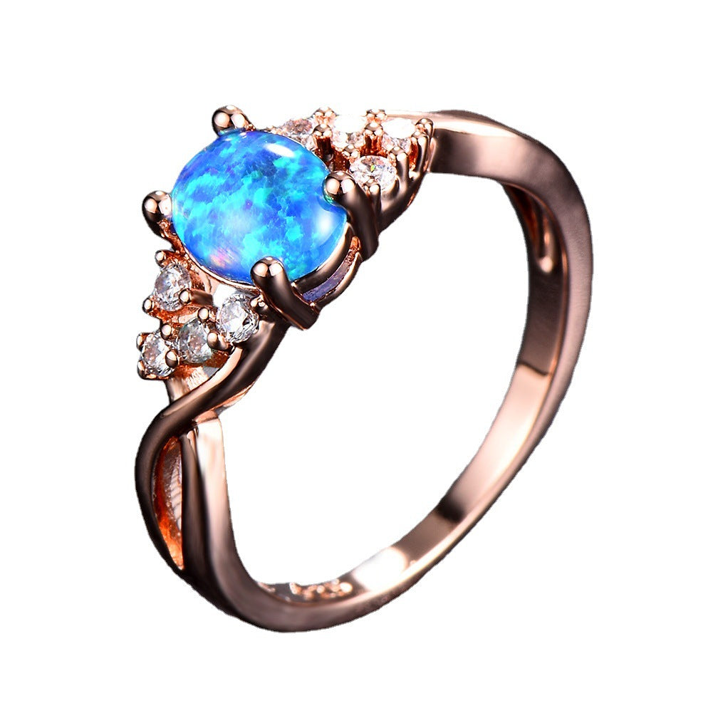 Damen Ring mit schimmerndem Opal und filigranen Zirkonia-Details Shop Nory