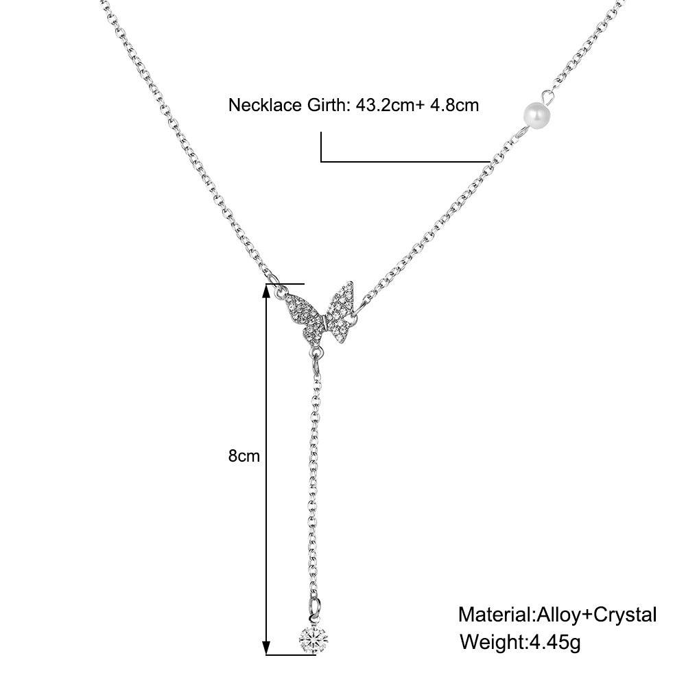 Damen Y-Halskette mit funkelndem Schmetterlingsanhänger und Perlendetails Shop Nory