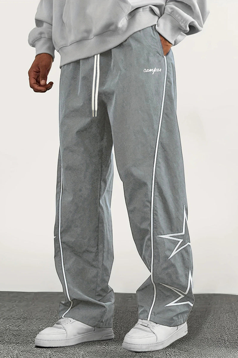 Herren Weite Trackpants mit Kontrastpaspel, Kordelzug und Sternapplikation Shop Nory