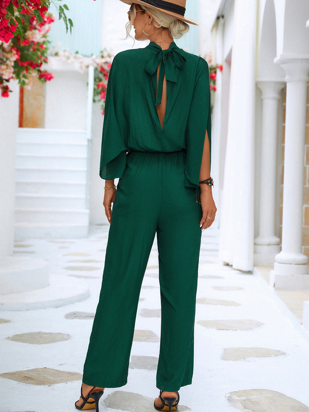 Damen Jumpsuit mit hohem Kragen und fließenden Ärmeln