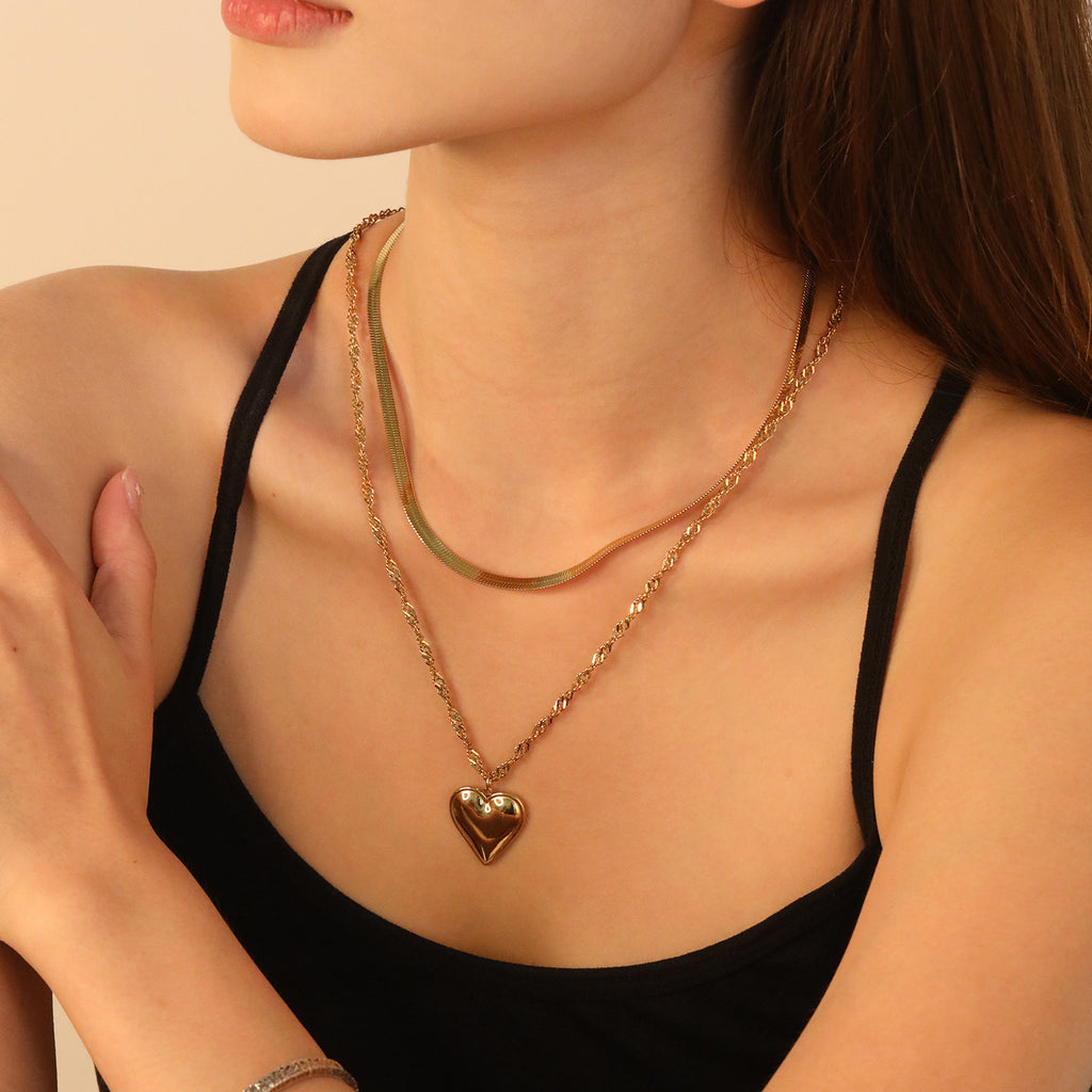 Damen Halskette mit mehrlagigem Herzanhänger und eleganter Gliederkette Shop Nory