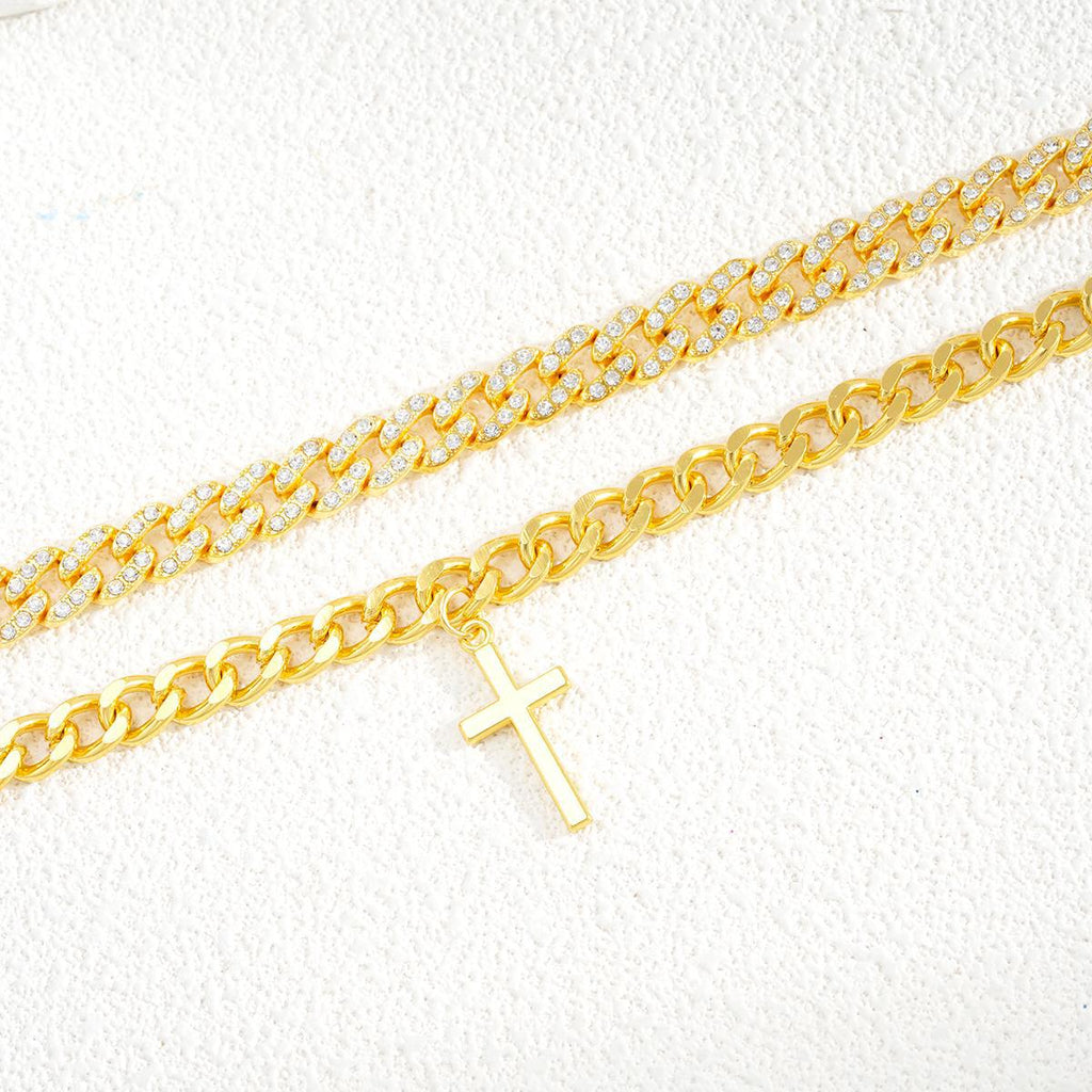 Damenarmreif mit verzierten Kristallen und Kreuzanhänger Shop Nory