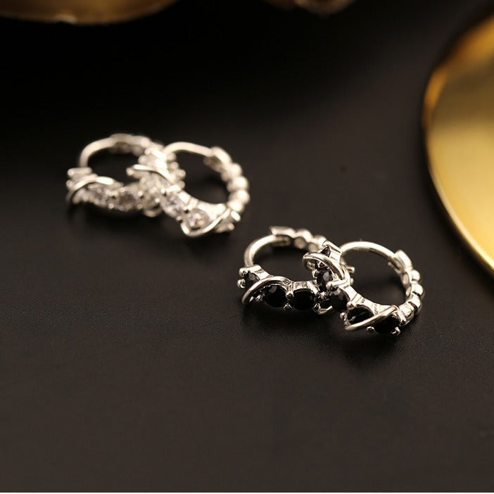 Damen Ohrringe mit funkelnden Zirkonia und eleganter Struktur Shop Nory