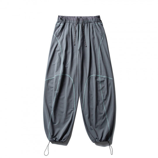 Unisex Locker geschnittene Tech-Jogginghose mit elastischem Bund, markanten Flatlock-Nähten und Kordelzug Shop Nory