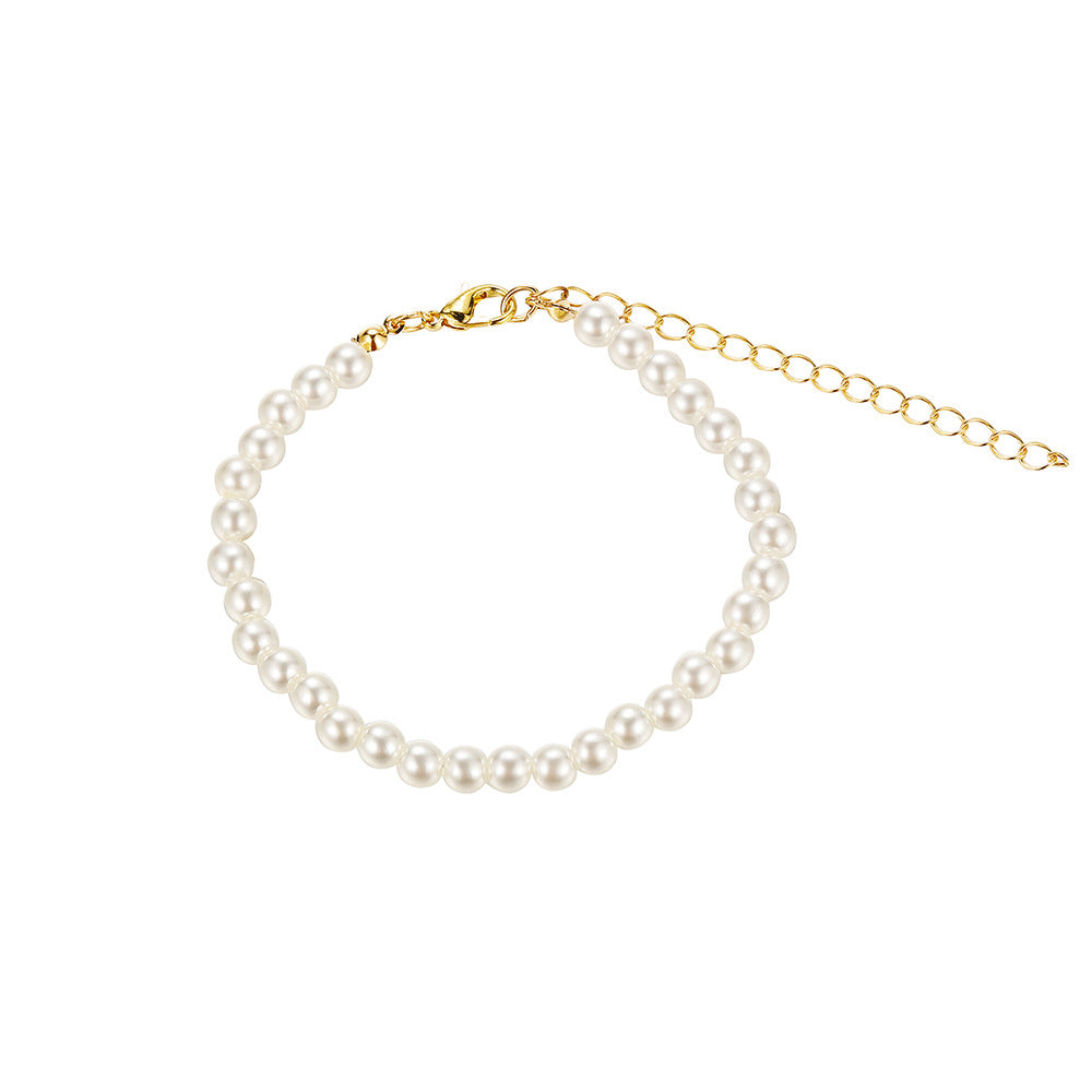 Damen Perlen-Halskette mit zarten goldenen Akzenten Shop Nory