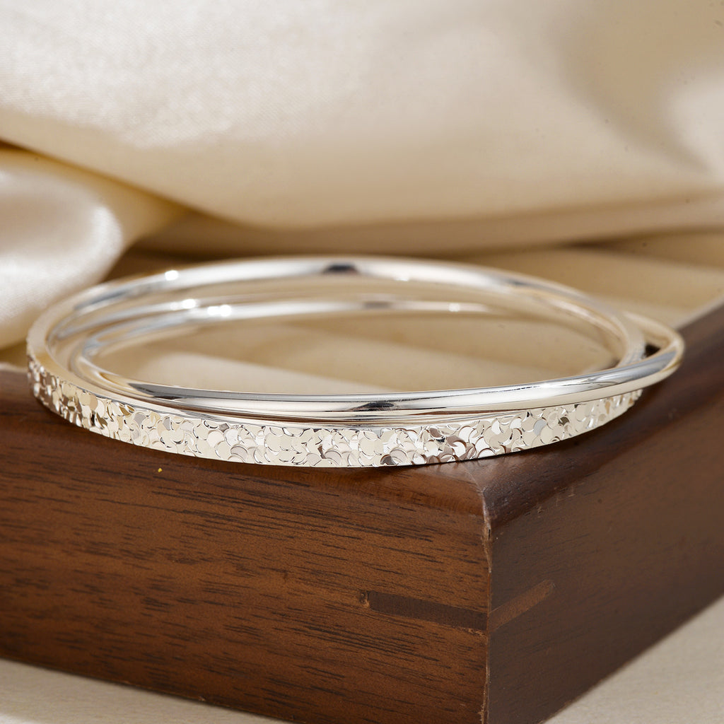 Damen eleganter Armreif mit kunstvollem Design Shop Nory