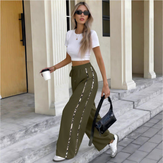 Damen Weite High‑Waist Loungehose mit Kordelzug und kontrastierenden Seitenstreifen Shop Nory