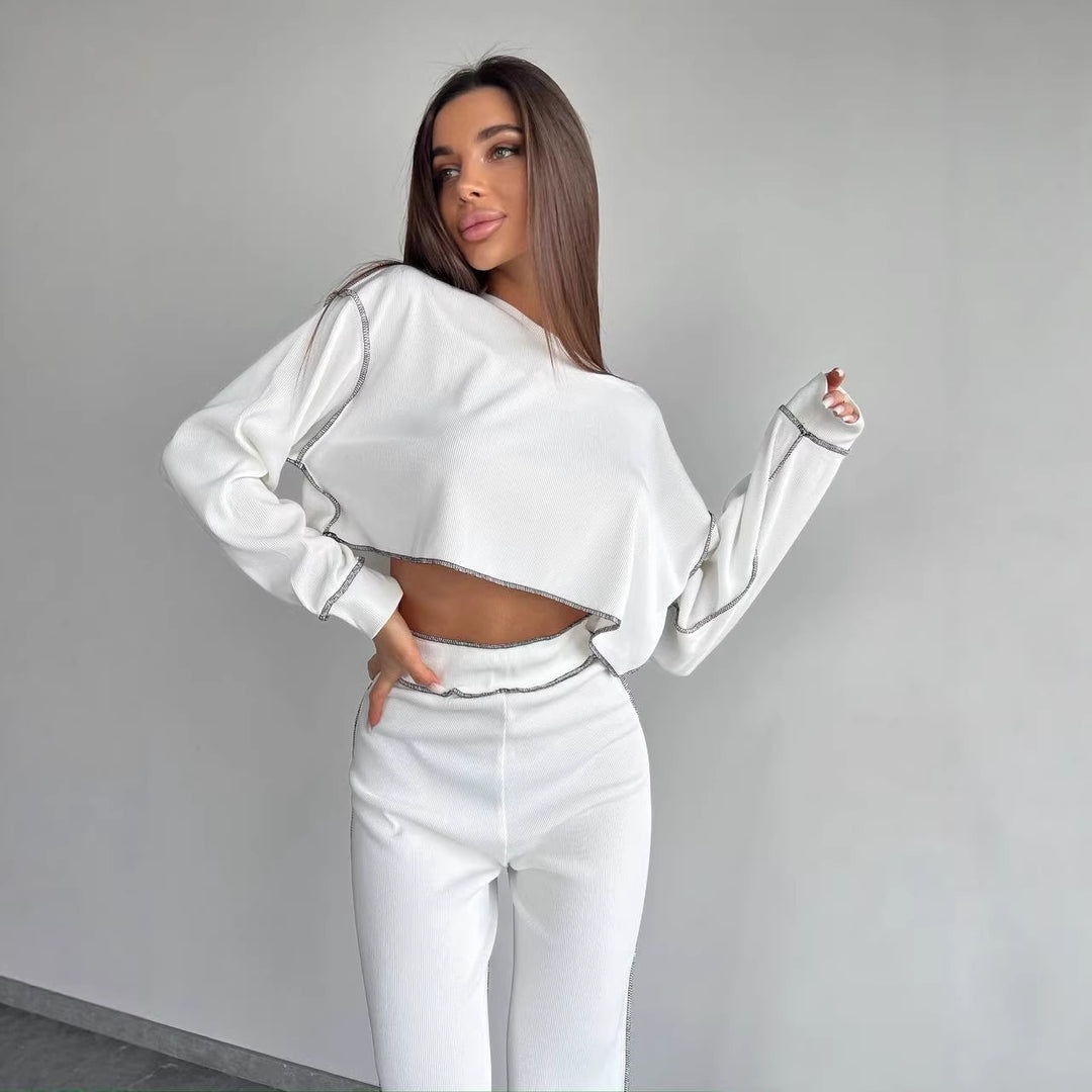Damen Cropped Oversized-Sweatshirt mit Overlocknähten und High-Waist ausgestellter Hose Set Shop Nory