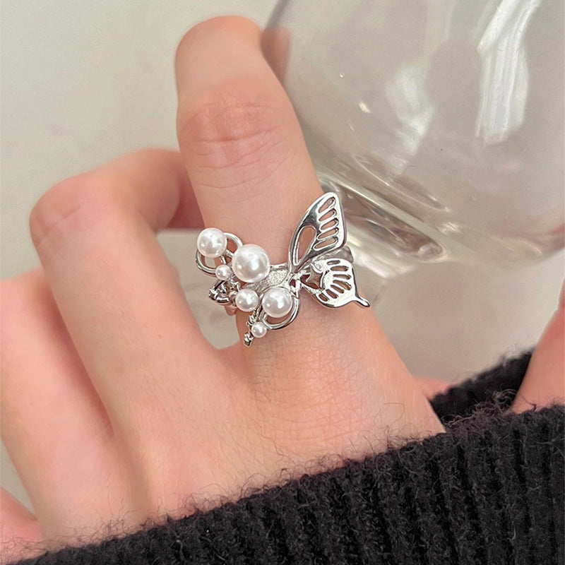Damen eleganter Ring mit Schmetterlingsdesign und Perlen Shop Nory