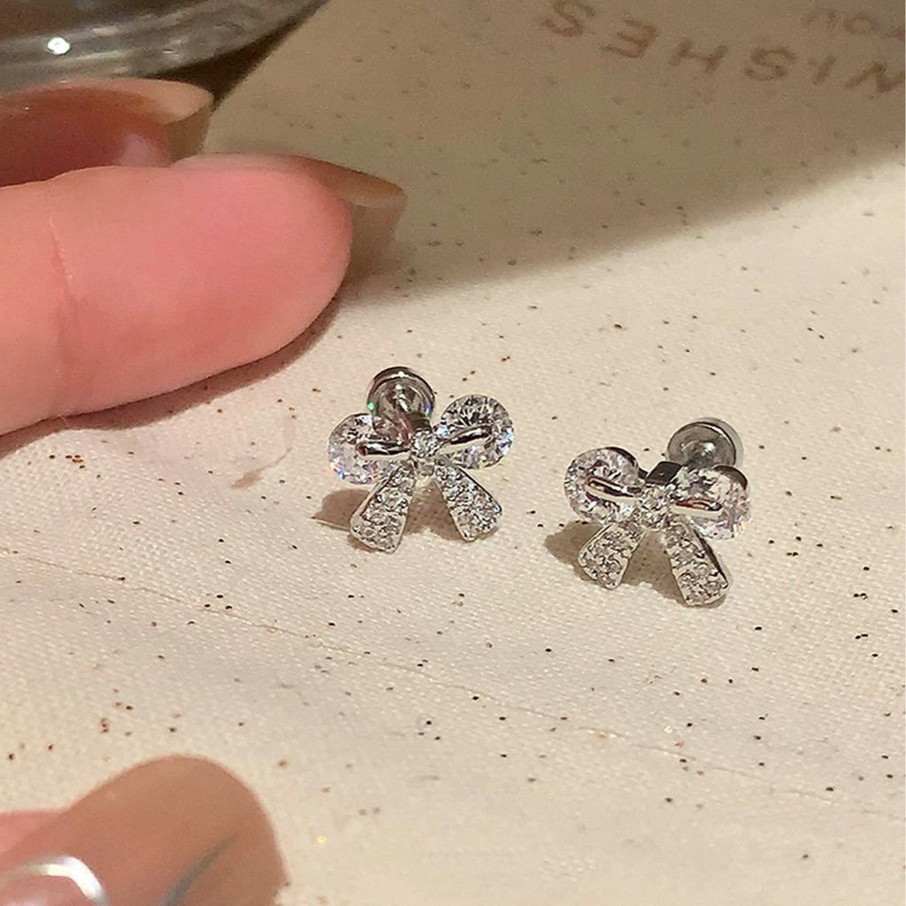 Damen Ohrstecker im zartem Schleifen-Design mit funkelnden Zirkonia Shop Nory