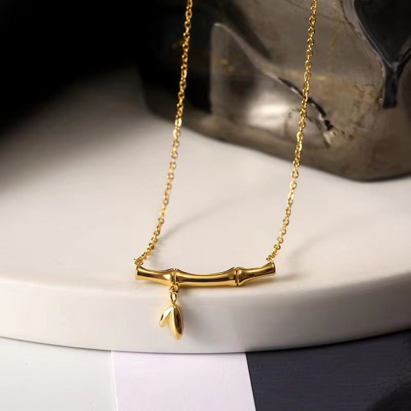 Damen Halskette mit filigranem Zweigdesign und elegantem Anhänger Shop Nory