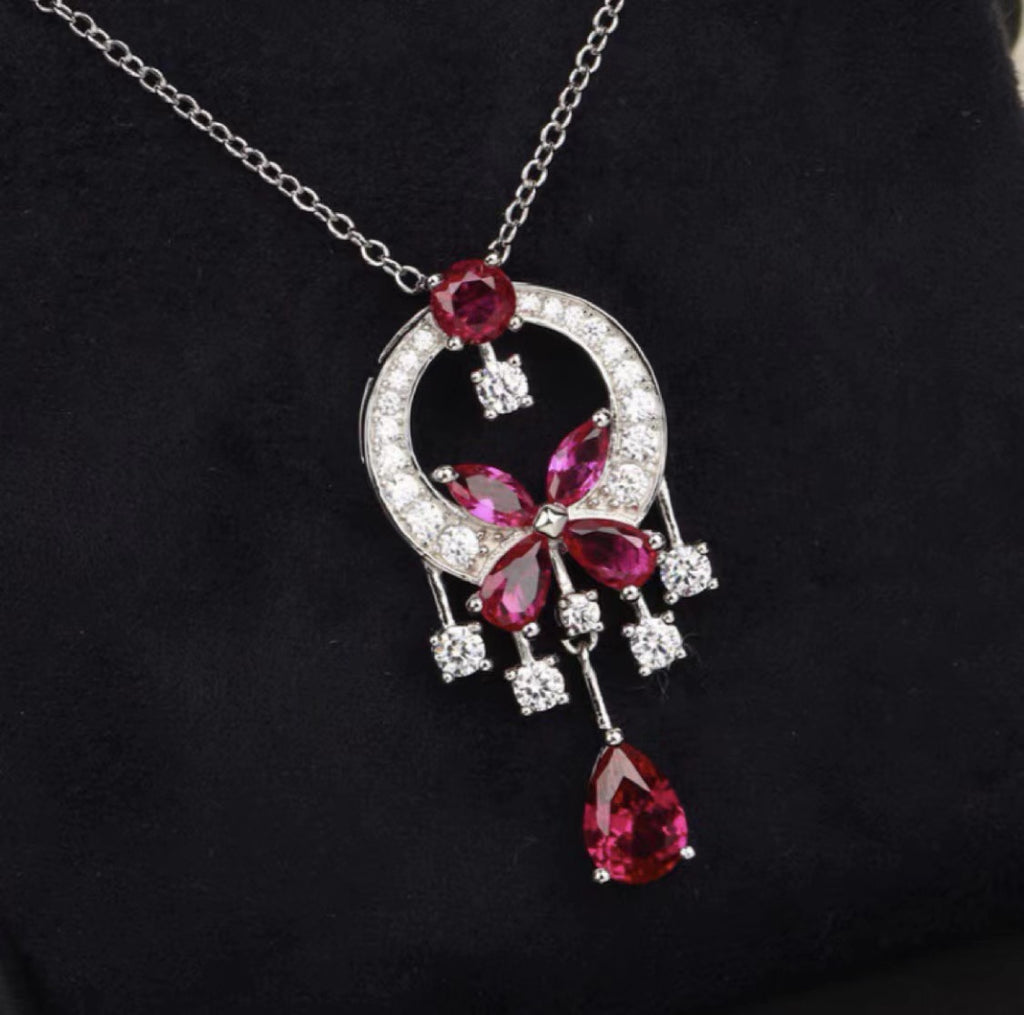 Damen Ohrringe mit funkelndem Edelstein und kunstvollem Blumenmotiv Shop Nory