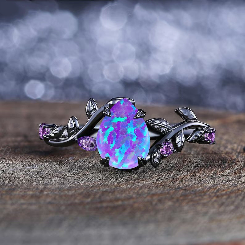 Damen Ring mit kunstvollem floralen Design und leuchtendem Opal Shop Nory
