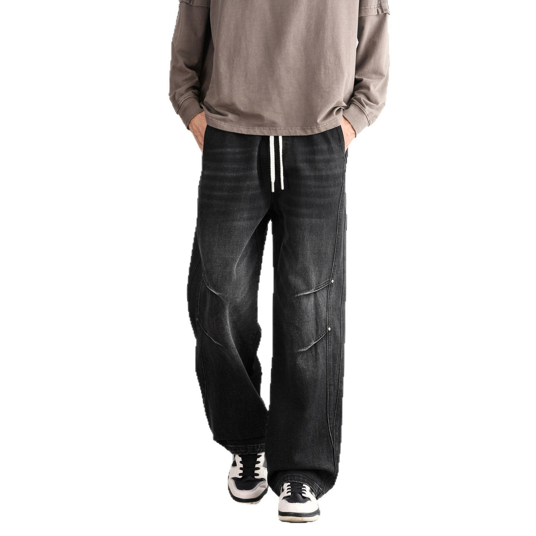 Herren Weite Denim-Hose mit Tunnelzugbund, Paneelnähten und Used-Waschung Shop Nory