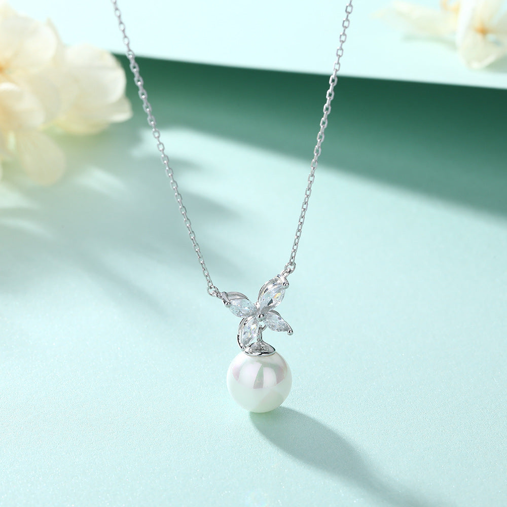 Damen Halskette mit elegantem Perlenanhänger und funkelnden Zirkonia-Details Shop Nory