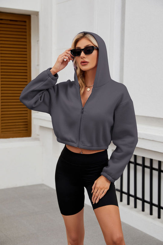 Damen Cropped Kapuzenjacke mit durchgehendem Reißverschluss und oversized Ärmeln Shop Nory